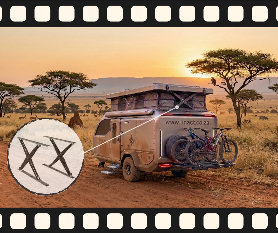 Automated X-Frame pop-up roof lift mechanism installed on an off-road camper trailer.